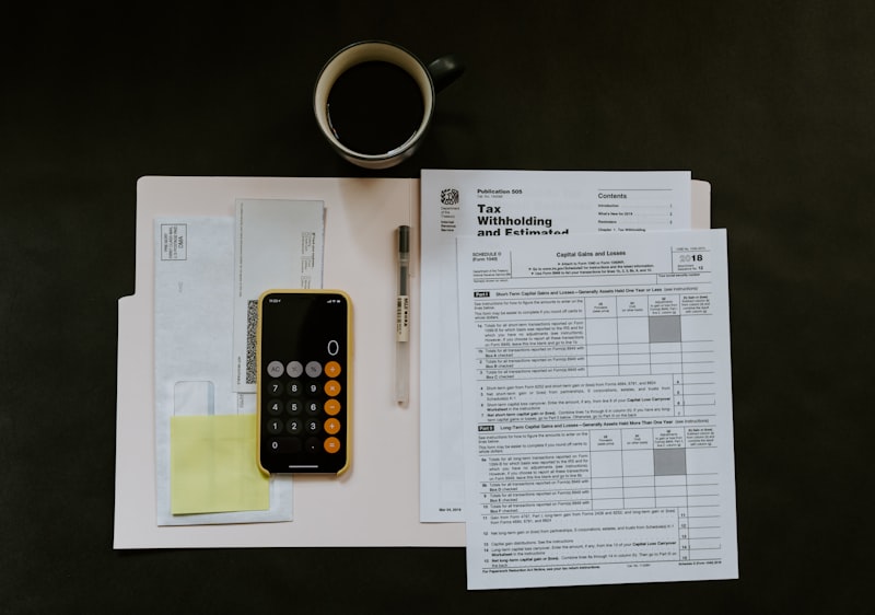 Financial documents and a calculator representing financial statements