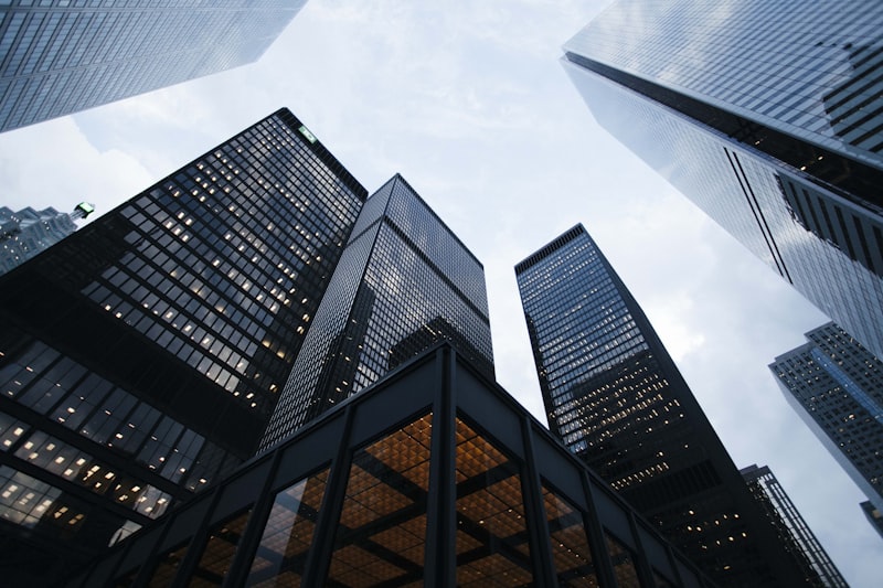 A city skyline of office buildings representing financial ratios and valuation