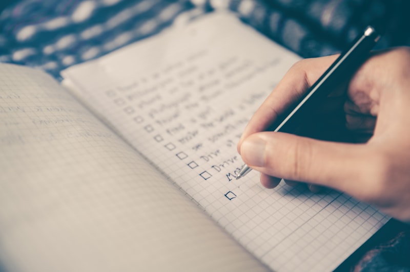 A planner and calendar representing scheduling and planning