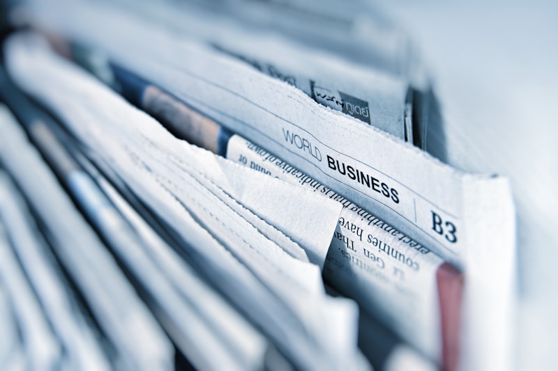 A stack of newspapers representing news and current events