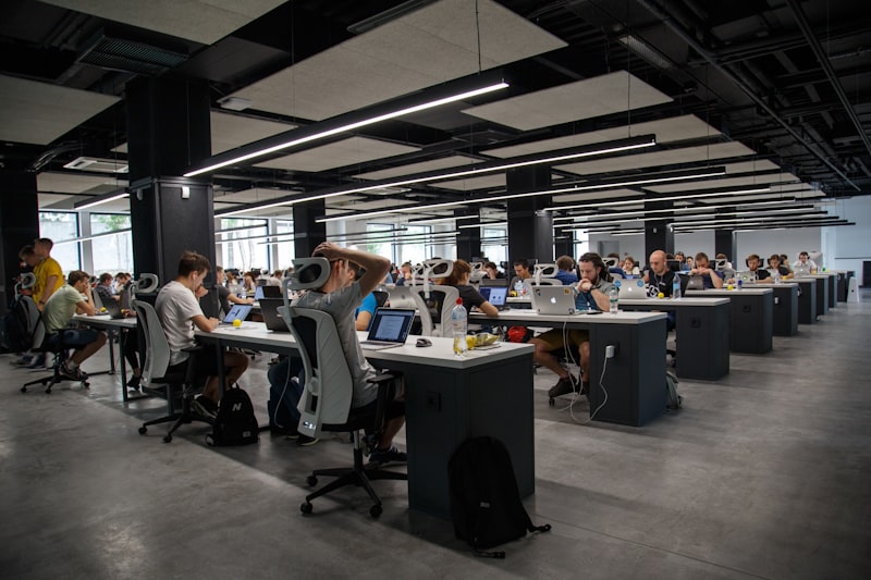 A person focused at a desk representing focused attention on relevant information